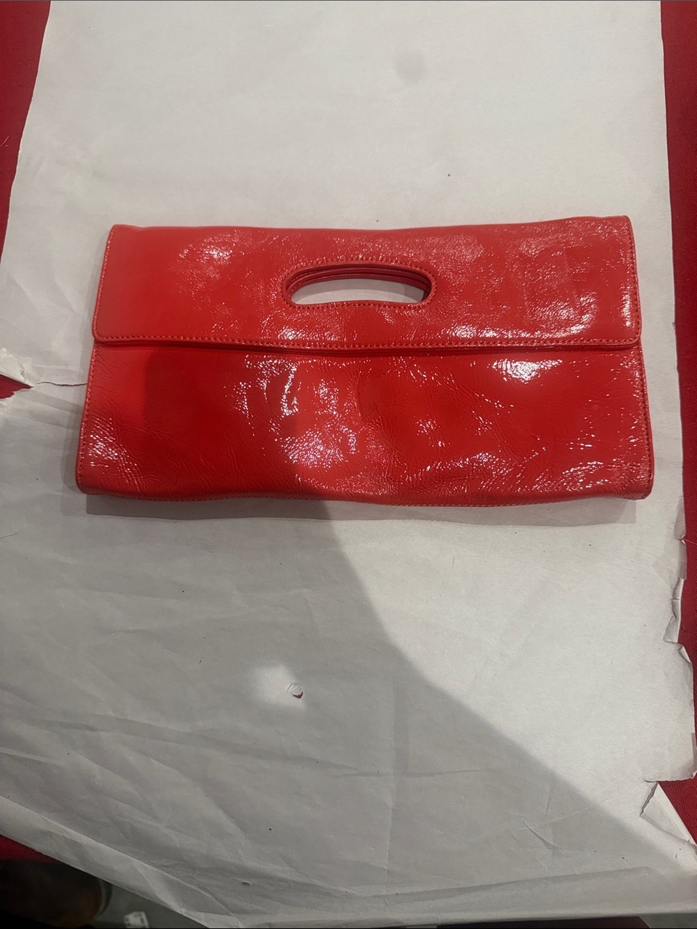 Hobo Sleek Red to coral Patent Leather Clutch with Cutout Handle